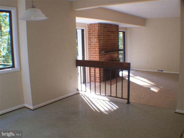 11807 Blue Spruce Road Reston, VA 20191 - Photo 10 of 30 an empty room with windows