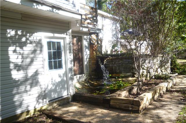 6908 Primm Springs Road Lyles, TN 37098 - Photo 8 of 19 Fish pond, water falls, quiet/peaceful setting.