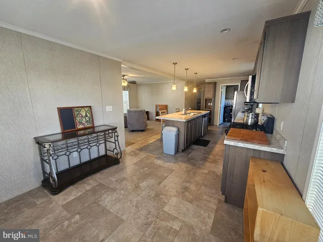 a view of a livingroom with furniture and windows