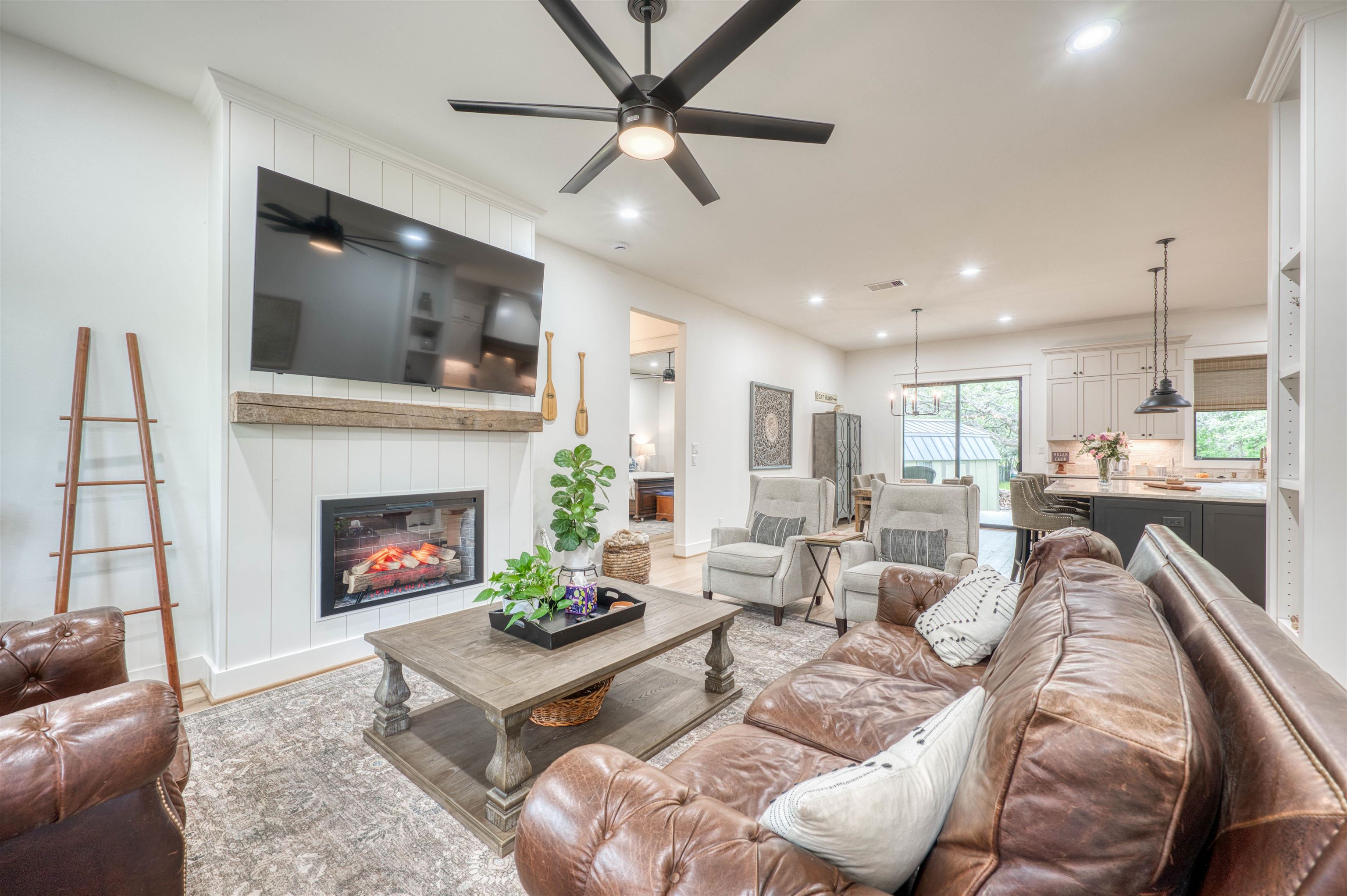 2001 Granite Cove Road Kingsland, TX 78639 - Photo 15 of 42 a living room with furniture and a fireplace