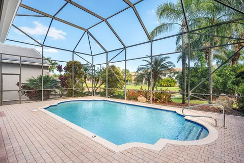 a view of outdoor space with swimming pool