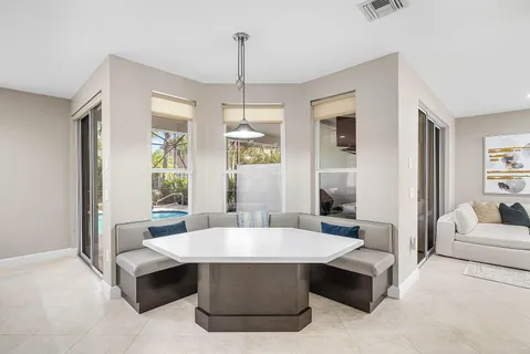 a view of a livingroom with furniture and window