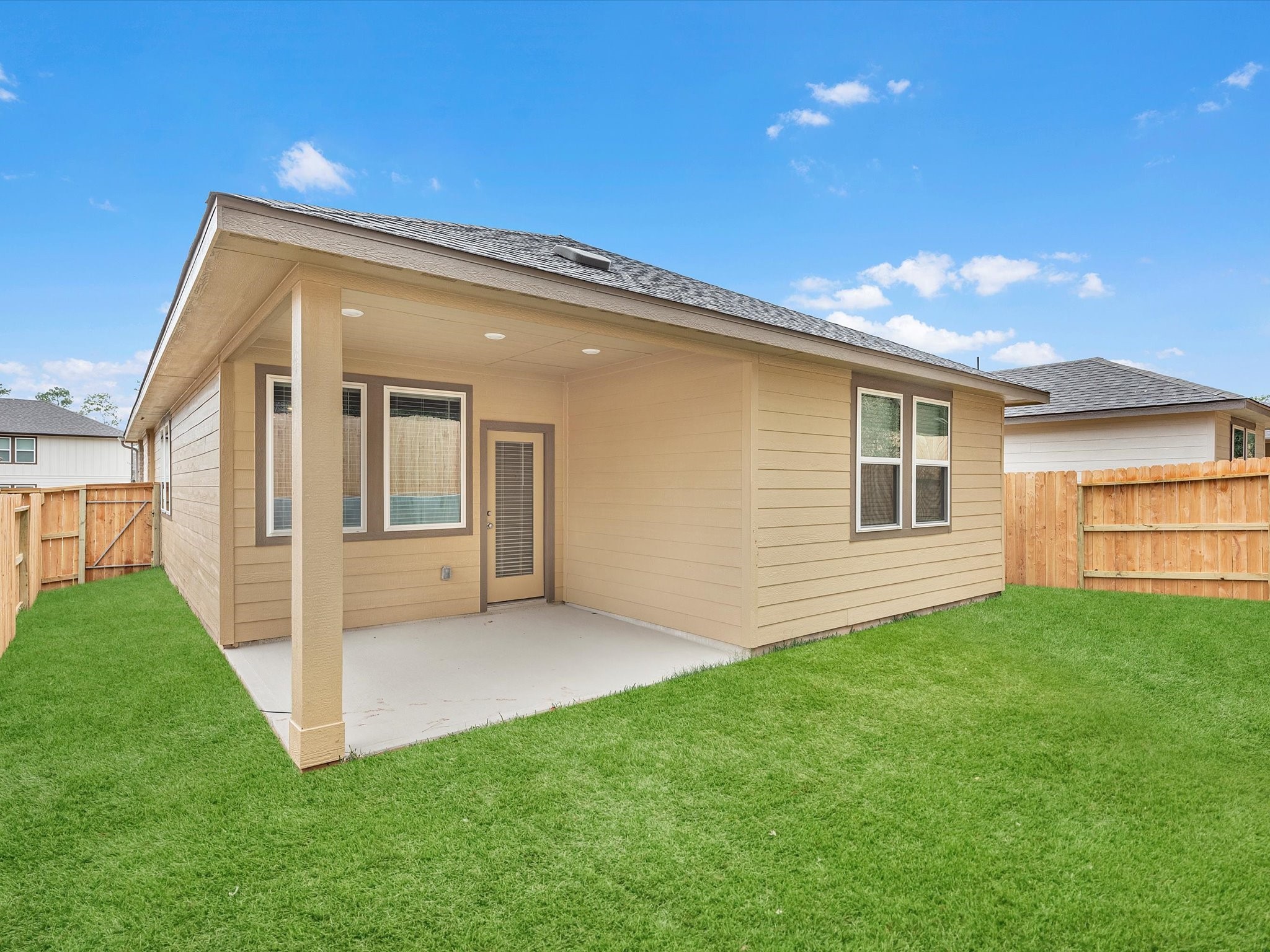 2010 West Darlington Oak Court Conroe, TX 77304 - Photo 25 of 26 a view of a house with backyard