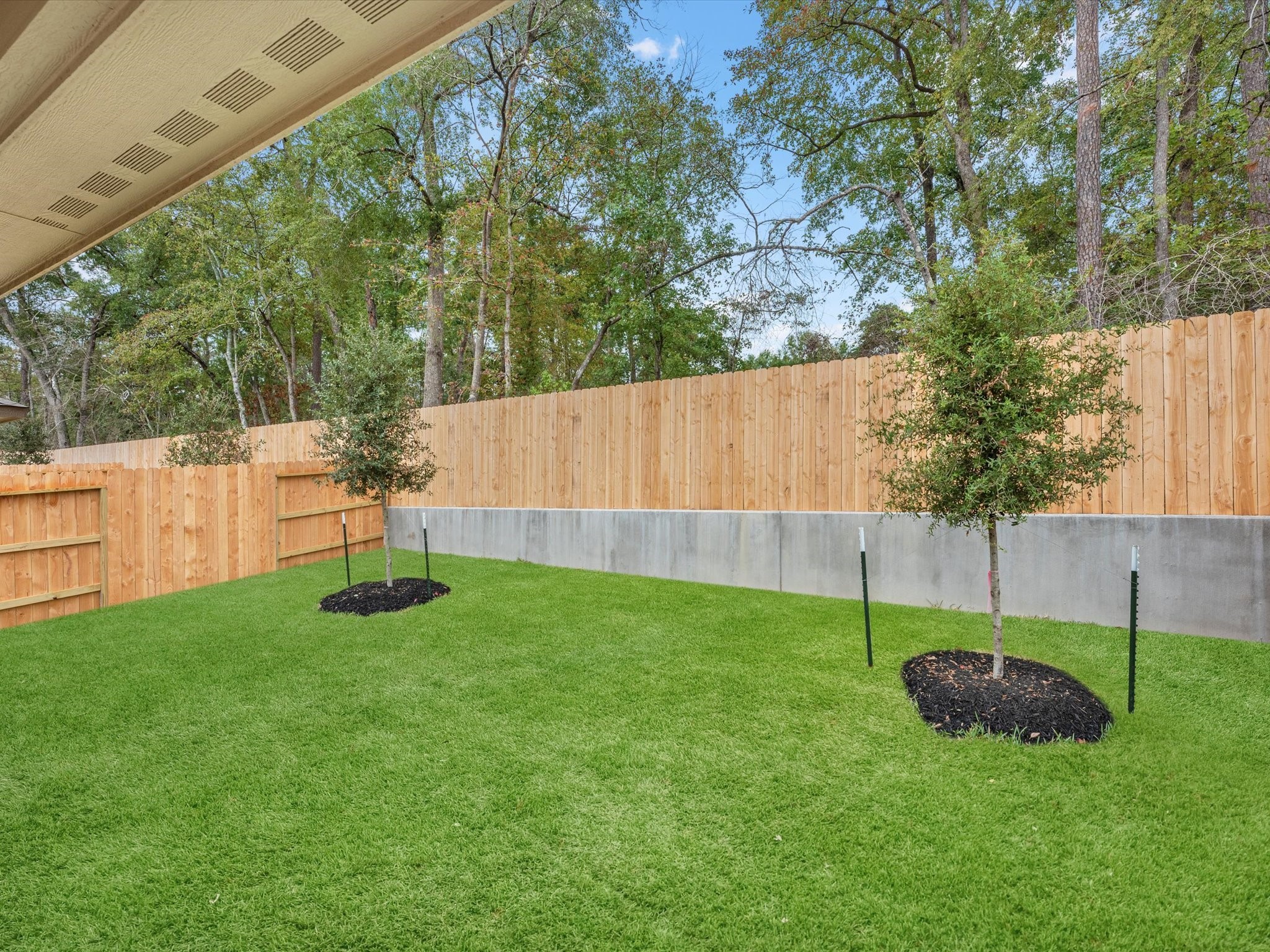 2010 West Darlington Oak Court Conroe, TX 77304 - Photo 26 of 26 a view of a backyard