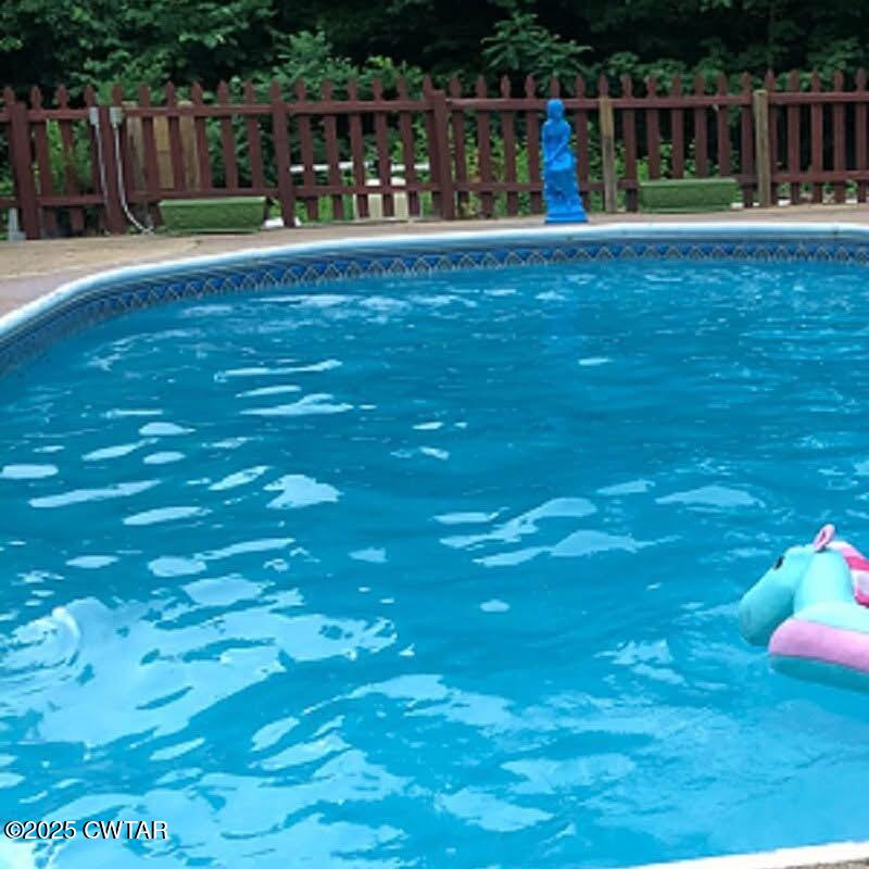 4310 Old Samburg Road Hornbeak, TN 38232 - Photo 15 of 20 a view of a backyard