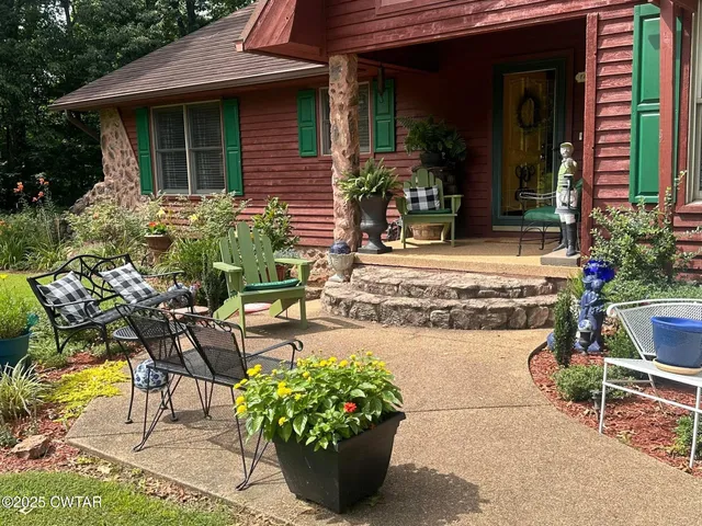 a view of a house with sitting area