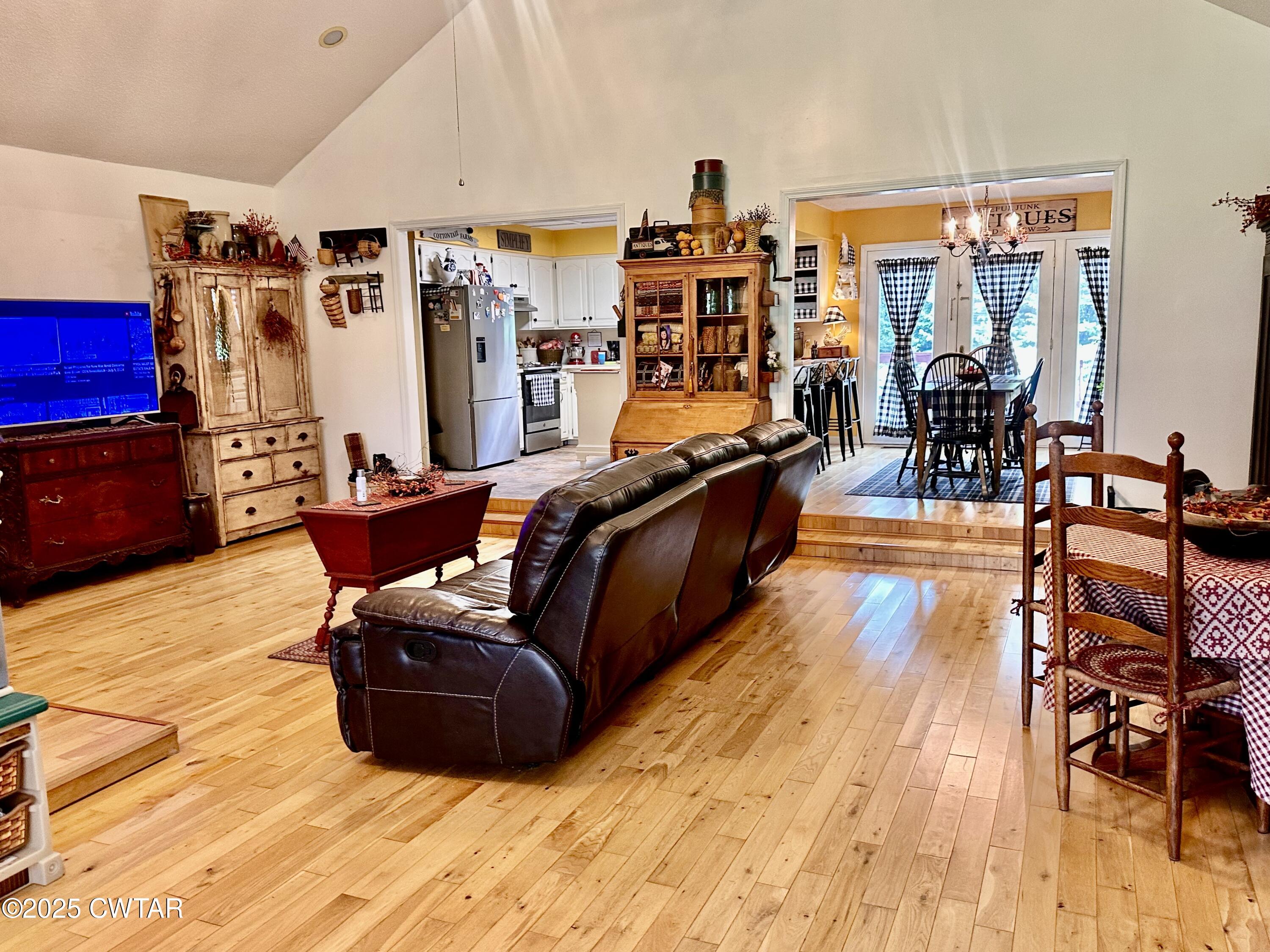 4310 Old Samburg Road Hornbeak, TN 38232 - Photo 5 of 20 a living room filled with furniture and wooden floor