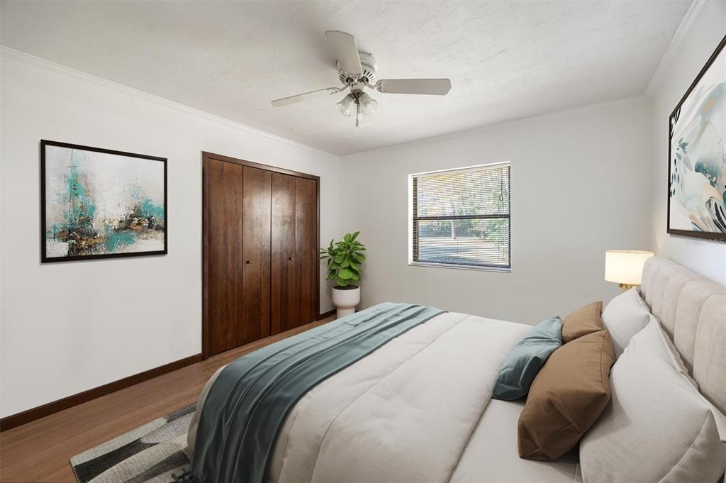 3811 Southwest 82nd Street Gainesville, FL 32608 - Photo 16 of 24 a bedroom with bed and a window