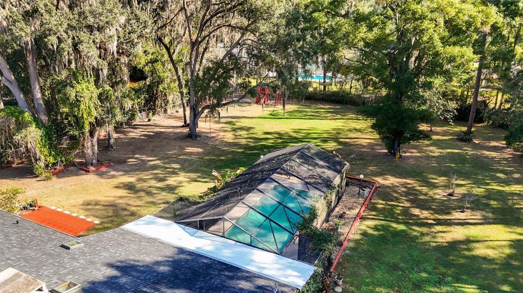 3811 Southwest 82nd Street Gainesville, FL 32608 - Photo 3 of 24 a view of a yard with plants