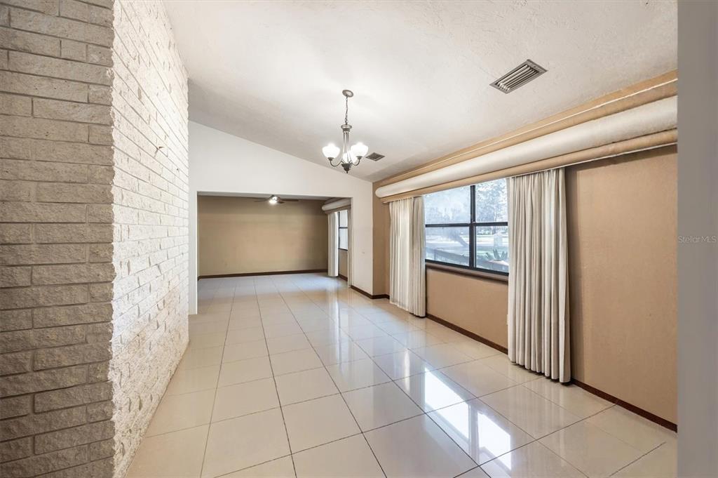 3811 Southwest 82nd Street Gainesville, FL 32608 - Photo 6 of 24 a view of an empty room and window