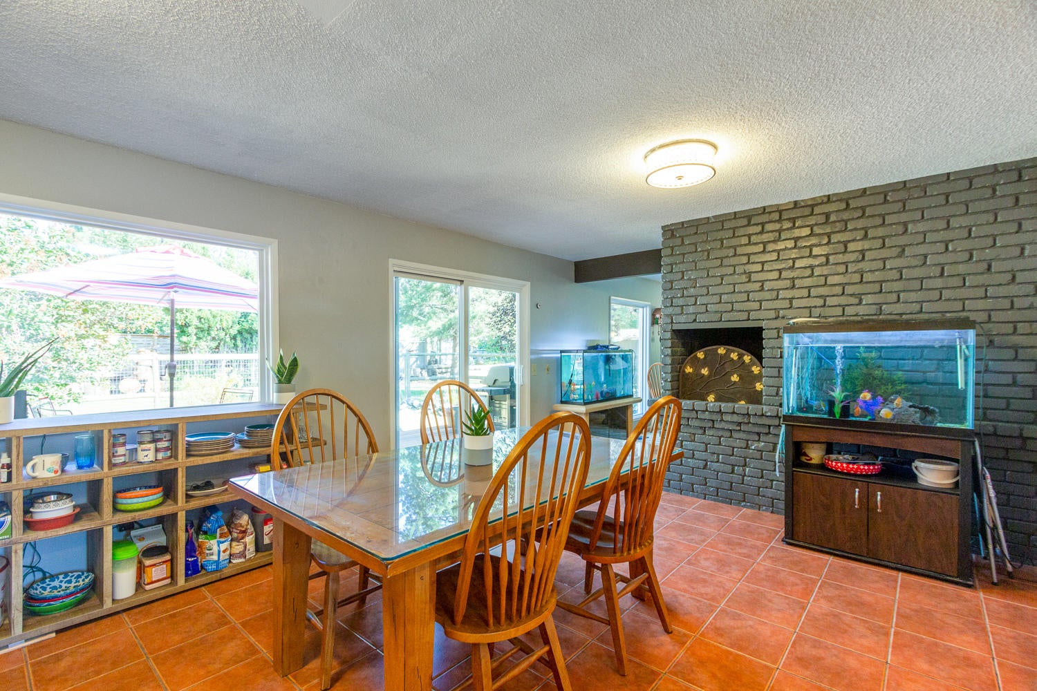 20388 Rae Road Bend, OR 97702 - Photo 21 of 30 Kitchen w/ brick wall & fireplace