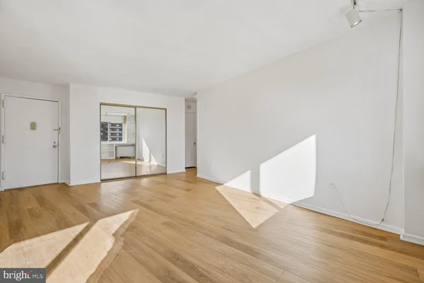 a view of an empty room and window