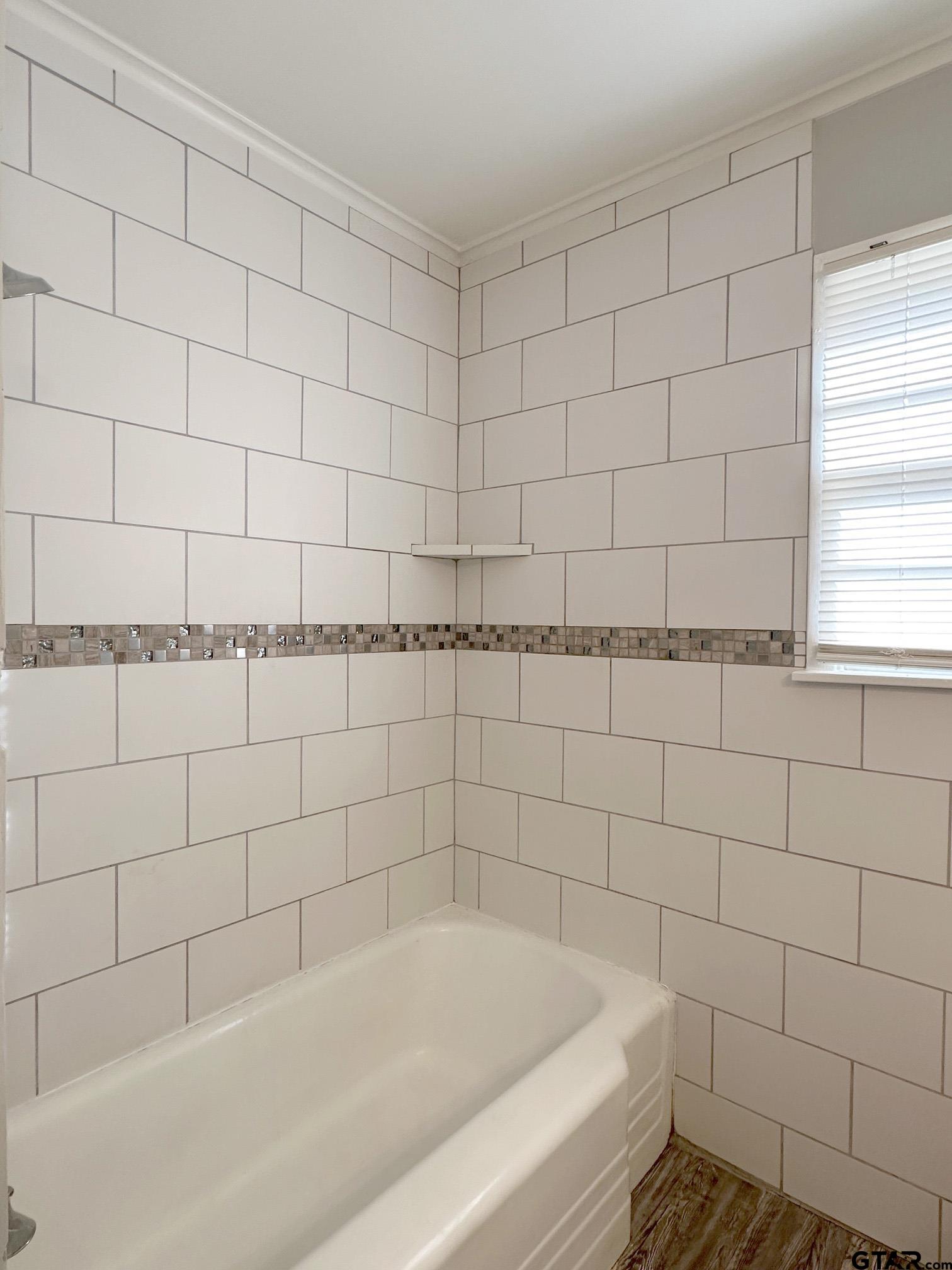 2331 Lingner Drive Tyler, TX 75701 - Photo 10 of 17 a bathroom with a bathtub