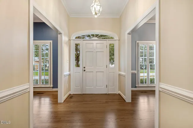 a view of a livingroom with wooden floor