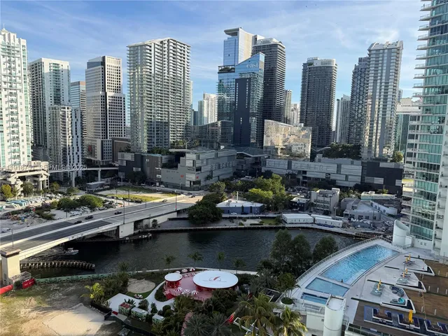 a view of swimming pool with outdoor seating