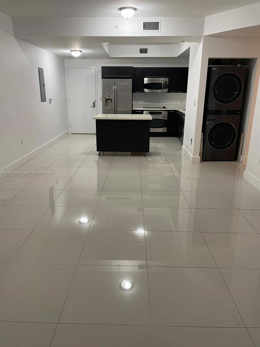 90 Southwest 3rd Street, Unit 2202 Miami, FL 33130 - Photo 27 of 33 a living room with furniture and gym equipment