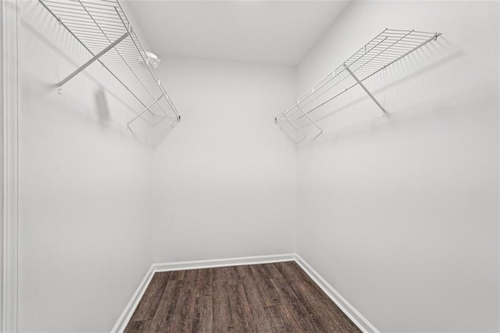 172 Meador Way Southeast Atlanta, GA 30315 - Photo 14 of 34 a view of a room with racks on the wall