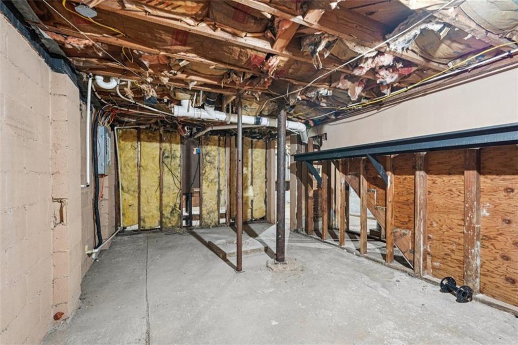 172 Meador Way Southeast Atlanta, GA 30315 - Photo 26 of 34 a view of an empty room with wooden walls
