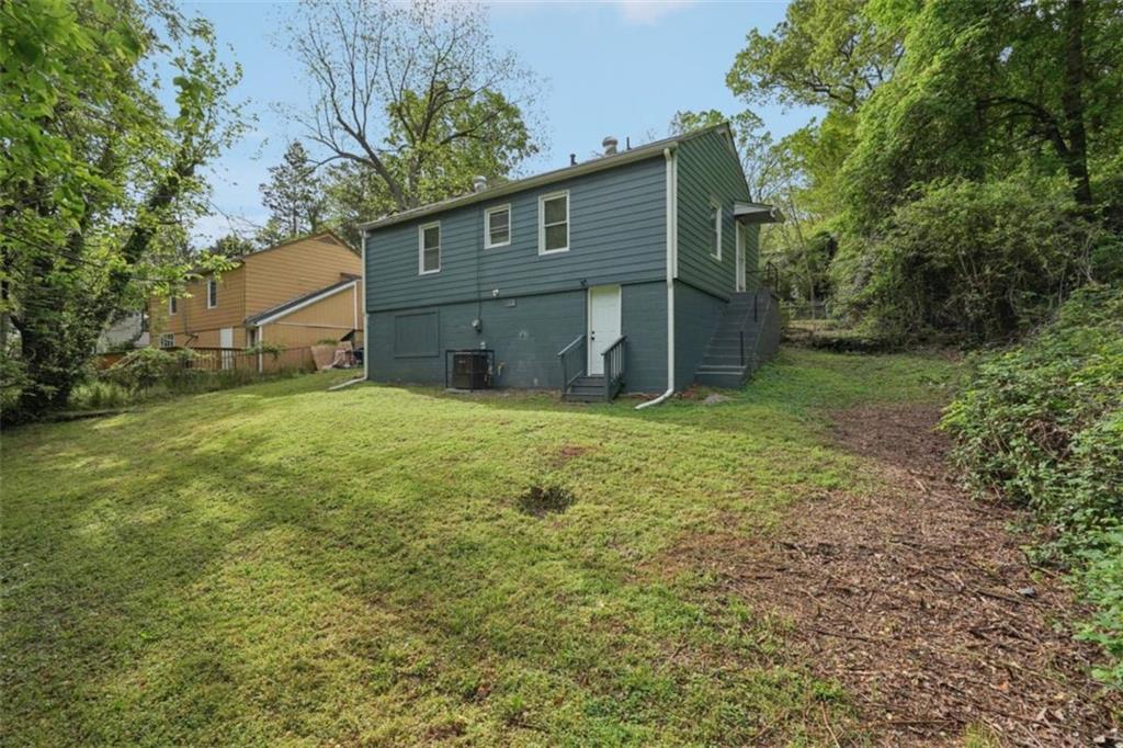 172 Meador Way Southeast Atlanta, GA 30315 - Photo 32 of 34 a view of a house with a yard
