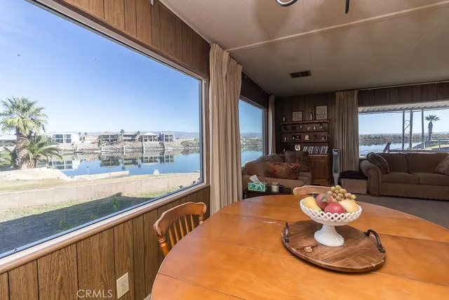 a kitchen with a sink appliances and cabinets