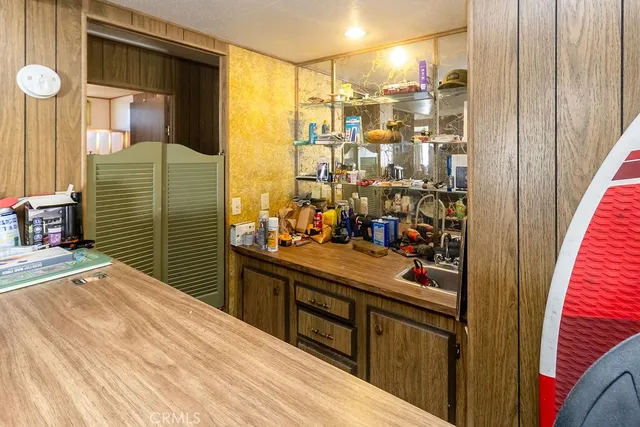 a bed room with a bed and a table