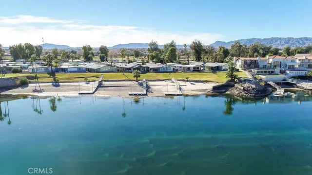 a view of swimming pool with outdoor seating and yard