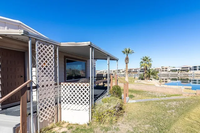 a view of a balcony with chairs