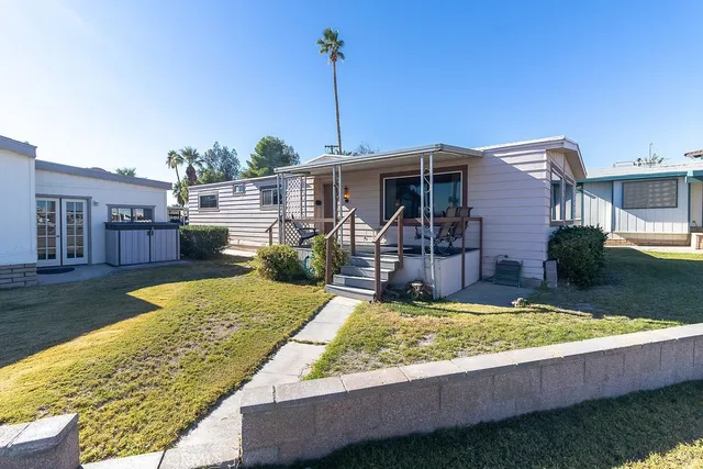 a view of a house with swimming pool