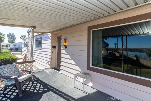 a view of a house with a yard and garage
