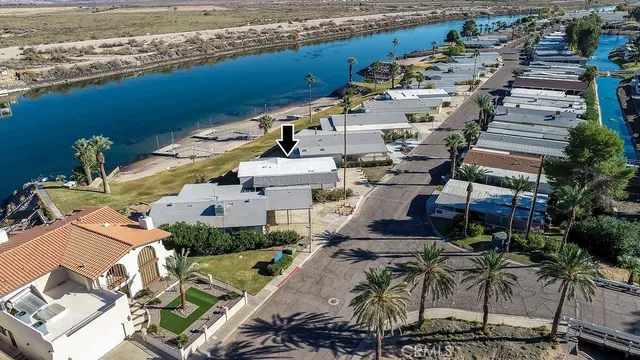 an aerial view of a house with outdoor space