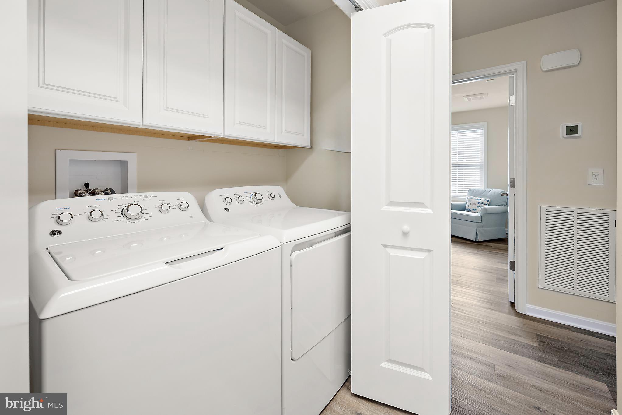 144 Clamshell Road Ocean City, MD 21842 - Photo 47 of 64 a utility room with dryer and washer