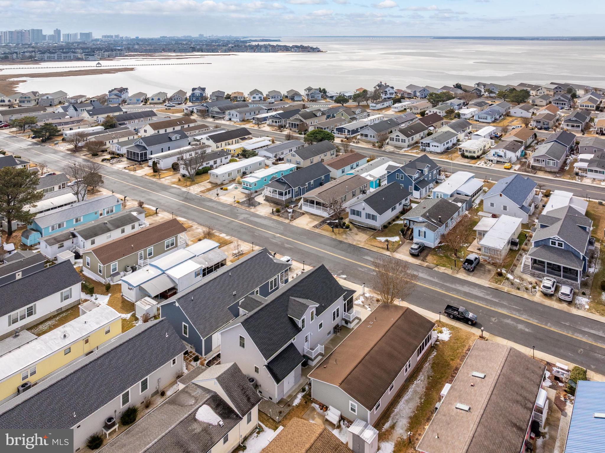 144 Clamshell Road Ocean City, MD 21842 - Photo 58 of 64 an aerial view of a city with ocean view