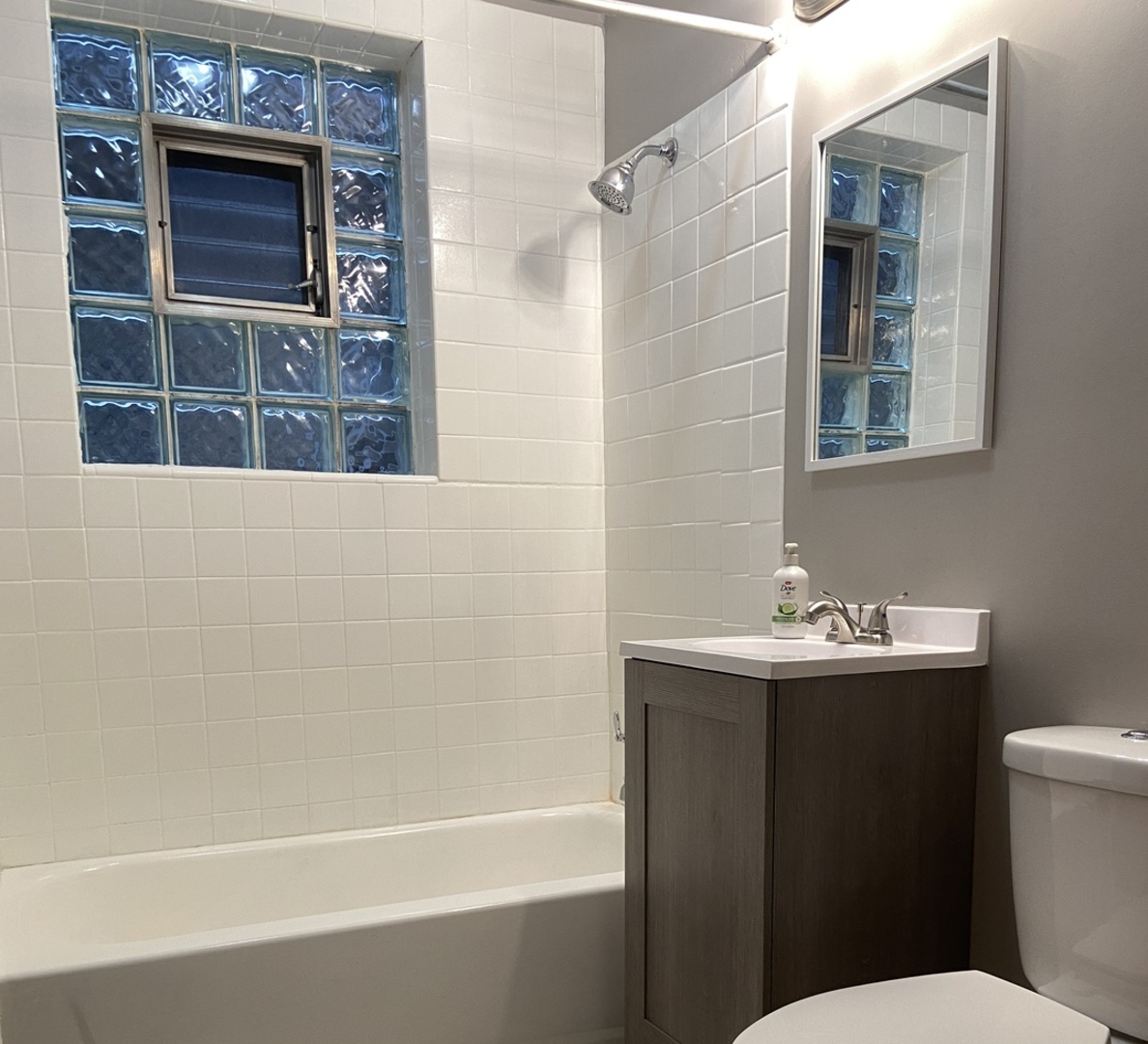 4818 South Springfield Avenue Chicago, IL 60632 - Photo 13 of 36 a bathroom with a sink toilet and shower