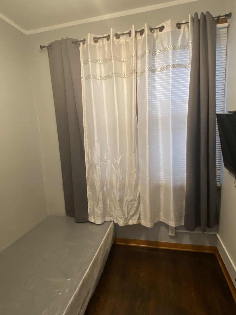 4818 South Springfield Avenue Chicago, IL 60632 - Photo 29 of 36 a view of walk in closet with water view