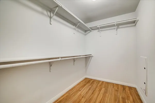 a view of a room with racks on the wall