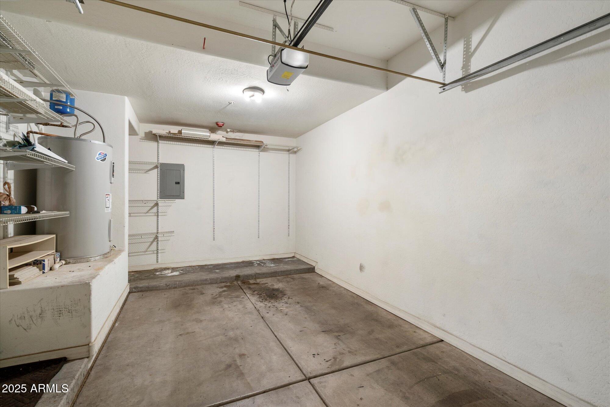2019 East Campbell Avenue, Unit 125 Phoenix, AZ 85016 - Photo 21 of 21 a view of a livingroom with a fireplace and a ceiling fan