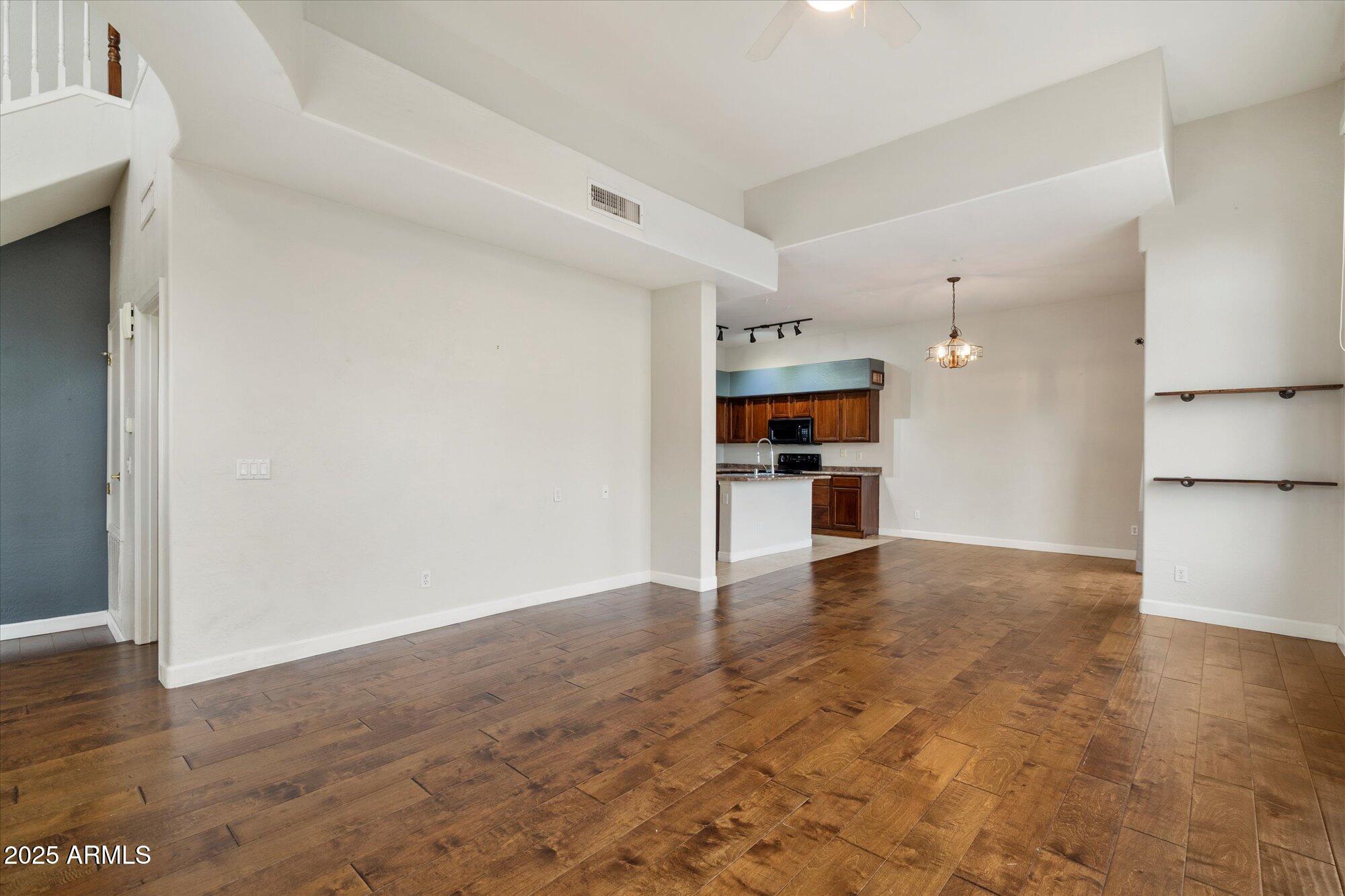 2019 East Campbell Avenue, Unit 125 Phoenix, AZ 85016 - Photo 5 of 21 a view of a kitchen with a sink and a refrigerator