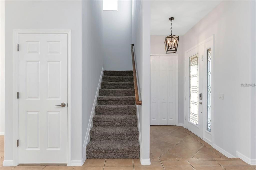 7327 Brightwaters Court New Port Richey, FL 34652 - Photo 14 of 45 a view of an entryway with stairs