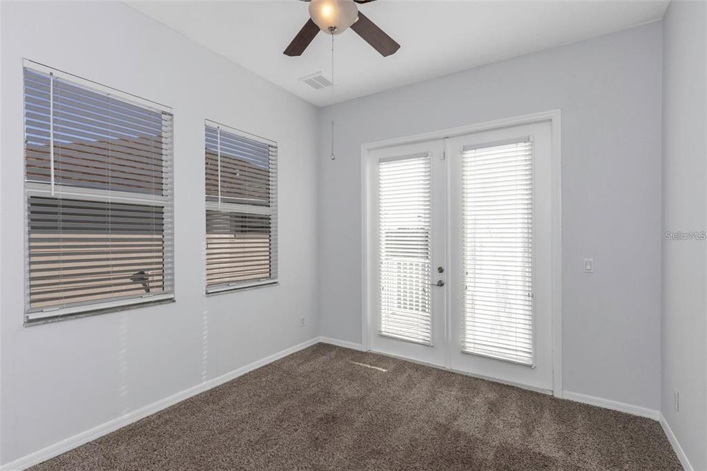 7327 Brightwaters Court New Port Richey, FL 34652 - Photo 29 of 45 a view of an empty room with a window