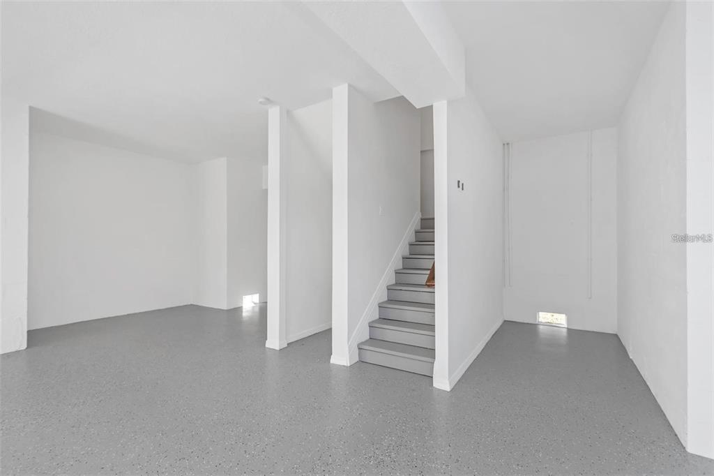 7327 Brightwaters Court New Port Richey, FL 34652 - Photo 35 of 45 a view of an empty room with stairs