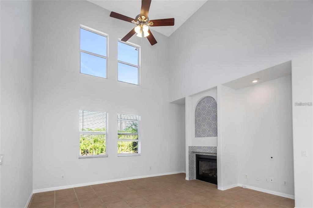 7327 Brightwaters Court New Port Richey, FL 34652 - Photo 6 of 45 a view of an empty room with a window