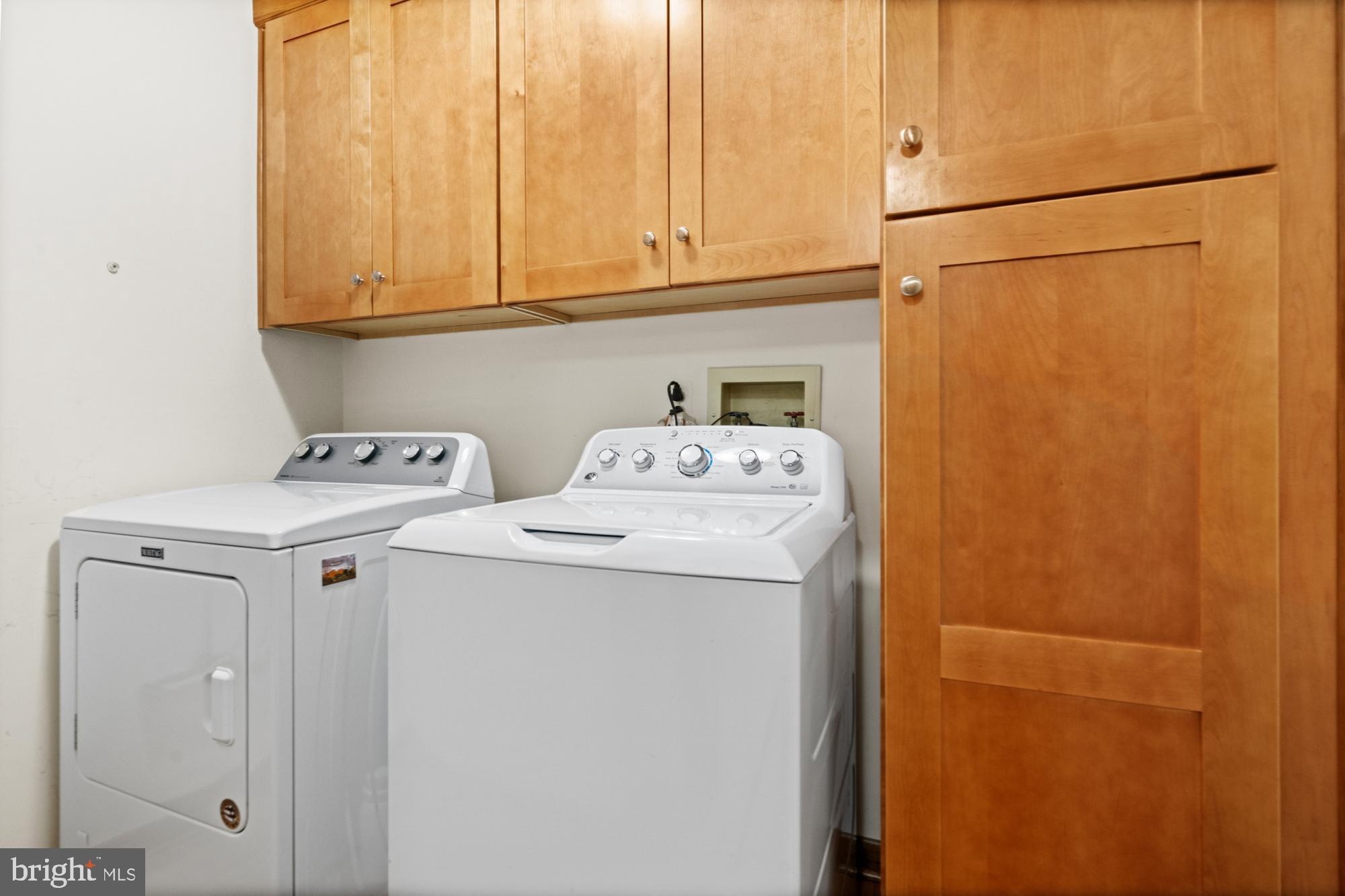 11 Carson Road Princeton, NJ 08540 - Photo 18 of 37 First floor laundry with cabinets for storage