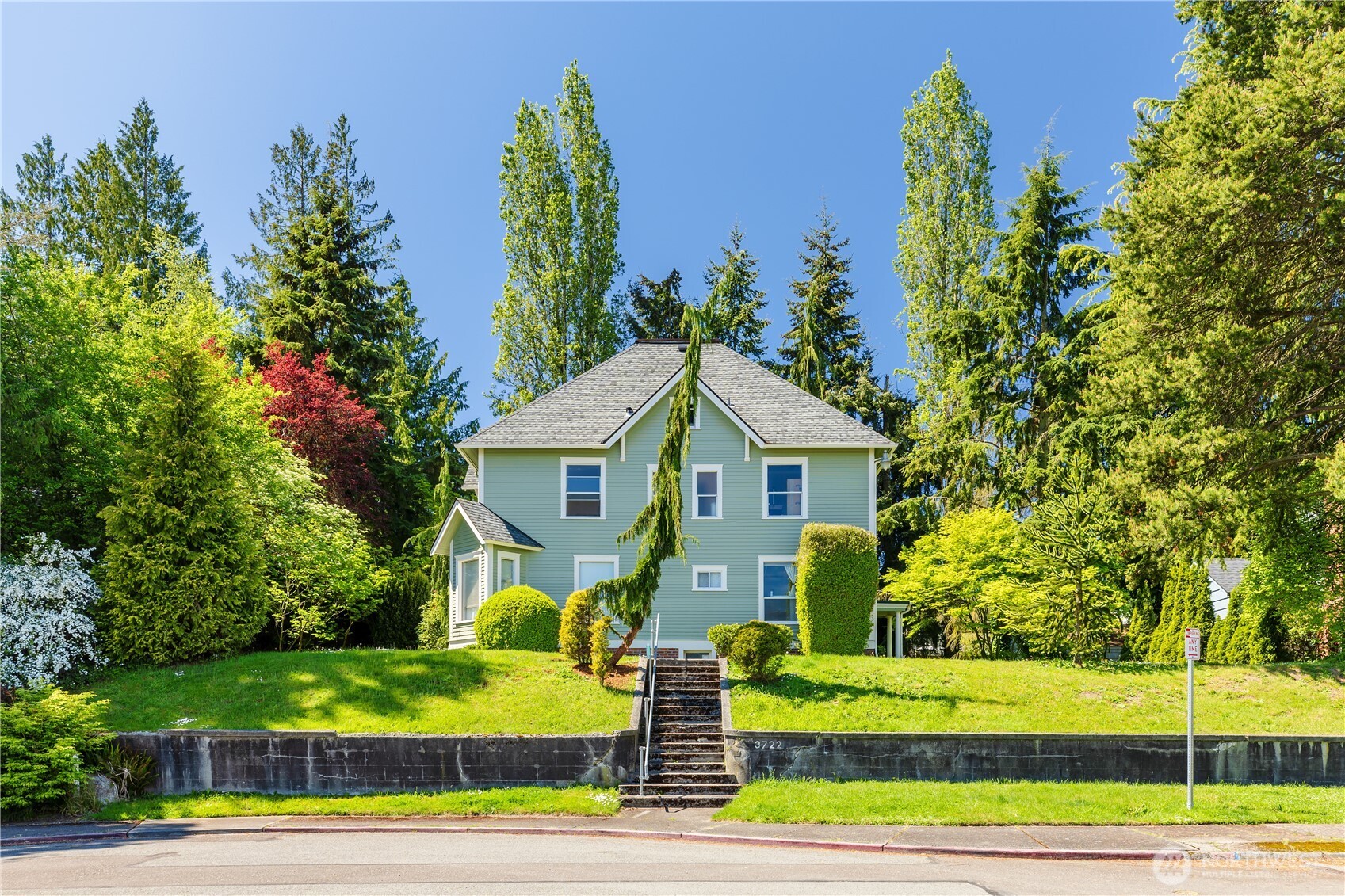 3722 Oakes Avenue Everett, WA 98201 - Photo 1 of 27 a view of a house with a yard and plants