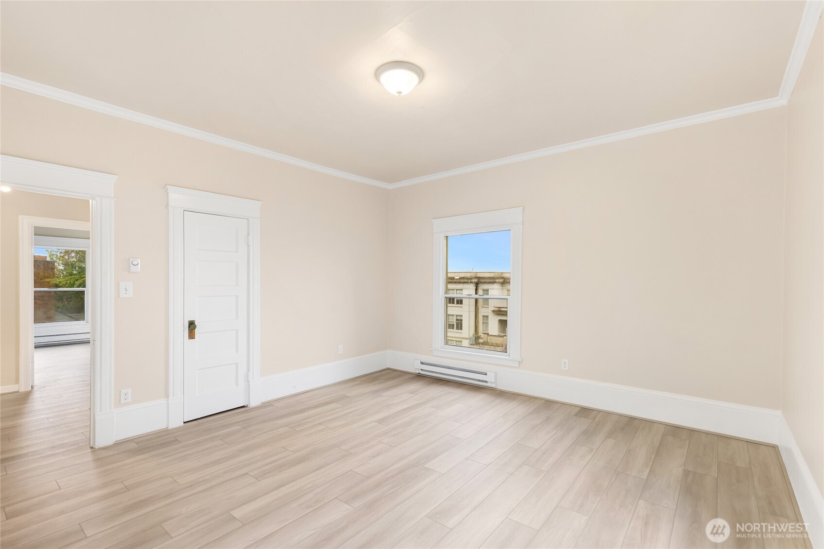3722 Oakes Avenue Everett, WA 98201 - Photo 23 of 27 an empty room with wooden floor and windows