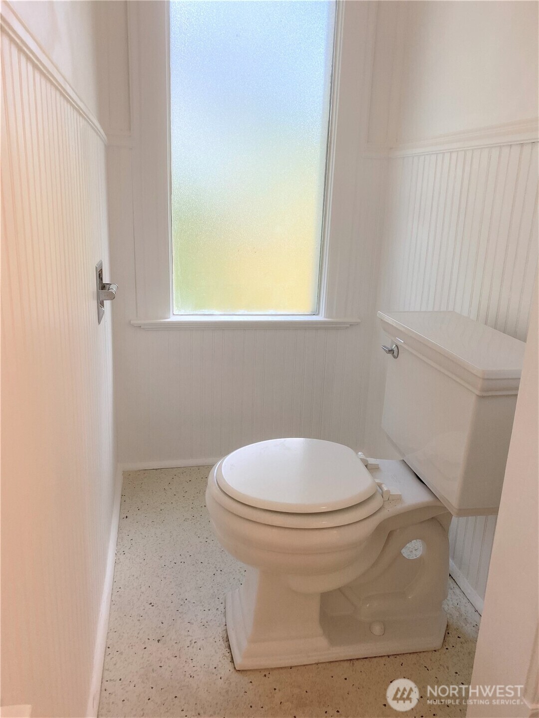 3722 Oakes Avenue Everett, WA 98201 - Photo 10 of 27 a white toilet sitting next to a window