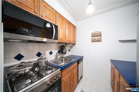 a kitchen with a stove and a microwave