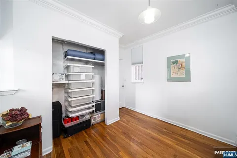 a room with furniture and wooden floor
