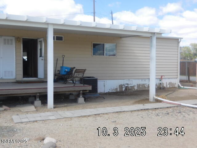 12085 Albert Way Reno, NV 89506 - Photo 13 of 14 a backyard of a house with barbeque oven table and chairs