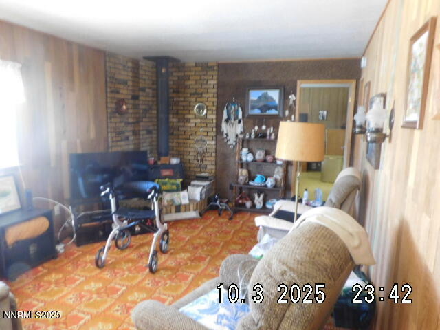 12085 Albert Way Reno, NV 89506 - Photo 7 of 14 a living room with furniture chess table and a lamp