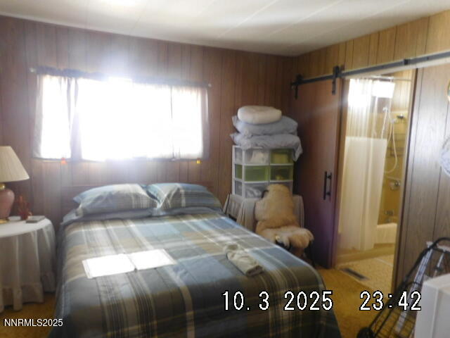 12085 Albert Way Reno, NV 89506 - Photo 9 of 14 a bedroom with a bed and a window